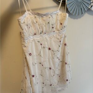 Jessica Simpson Elegant Cream Dress with Floral Accents